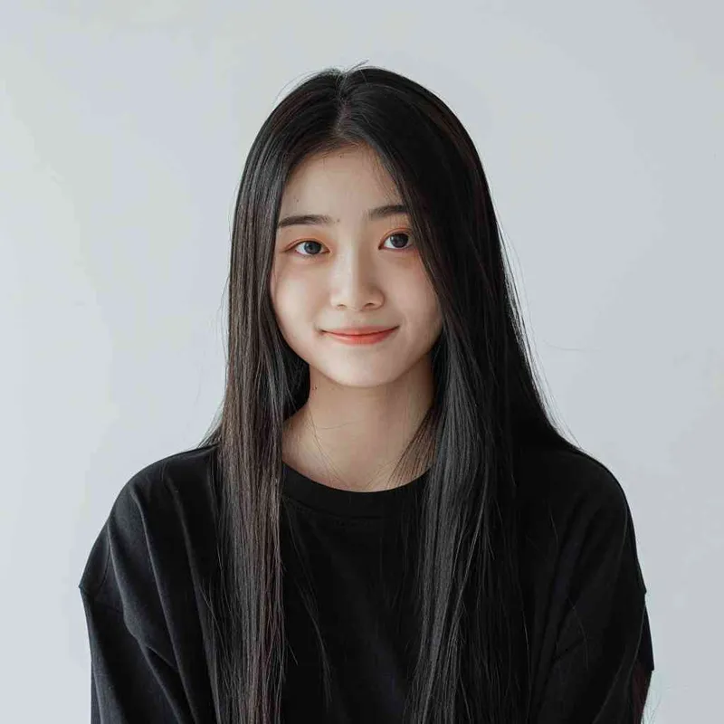 A Chinese girl with long black hair and wearing a dark long-sleeved round-neck T-shirt is smiling at the camera. The background color should be white to highlight his face. She has an Asian nose shape, medium skin tone, round eyes, and thin eyebrows. Her overall appearance conveys friendliness or confidence.--ar 1:1 --q 1 --v 6.0 - style3部分