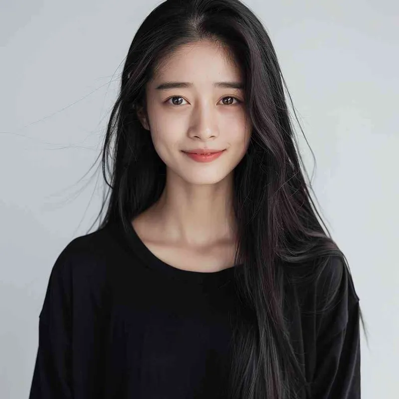 A Chinese girl with long black hair and wearing a dark long-sleeved round-neck T-shirt is smiling at the camera. The background color should be white to highlight his face. She has an Asian nose shape, medium skin tone, round eyes, and thin eyebrows. Her overall appearance conveys friendliness or confidence.--ar 1:1 --q 1 --v 6.0 - style1部分