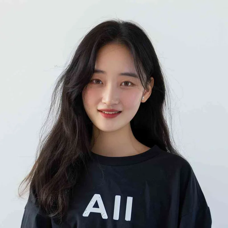 A Chinese girl with long black hair and a dark long-sleeved round-neck T-shirt with the 