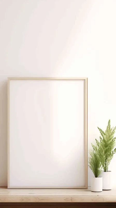 A delicate vertical rectangular photo frame rests on a wooden shelf, contrasting with a backdrop of a flawless white wall illuminated by a stream of sunlight. The image presents a balanced and elegant arrangement, with the plant flawlessly positioned at the center of the frame. - style1部分