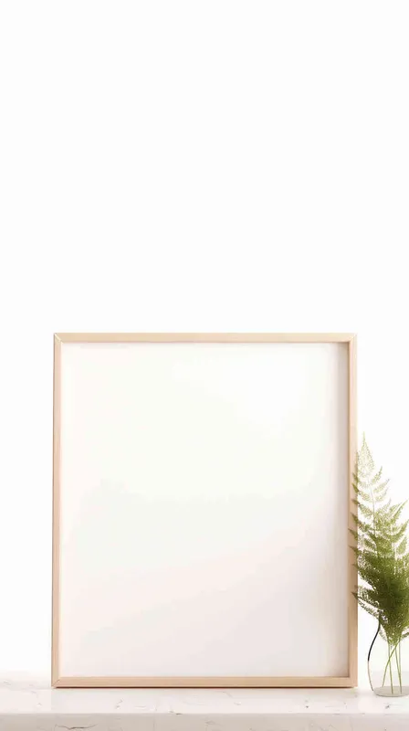 A delicate vertical rectangular photo frame rests on a wooden shelf, contrasting with a backdrop of a flawless white wall illuminated by a stream of sunlight. The image presents a balanced and elegant arrangement, with the plant flawlessly positioned at the center of the frame. - style2部分