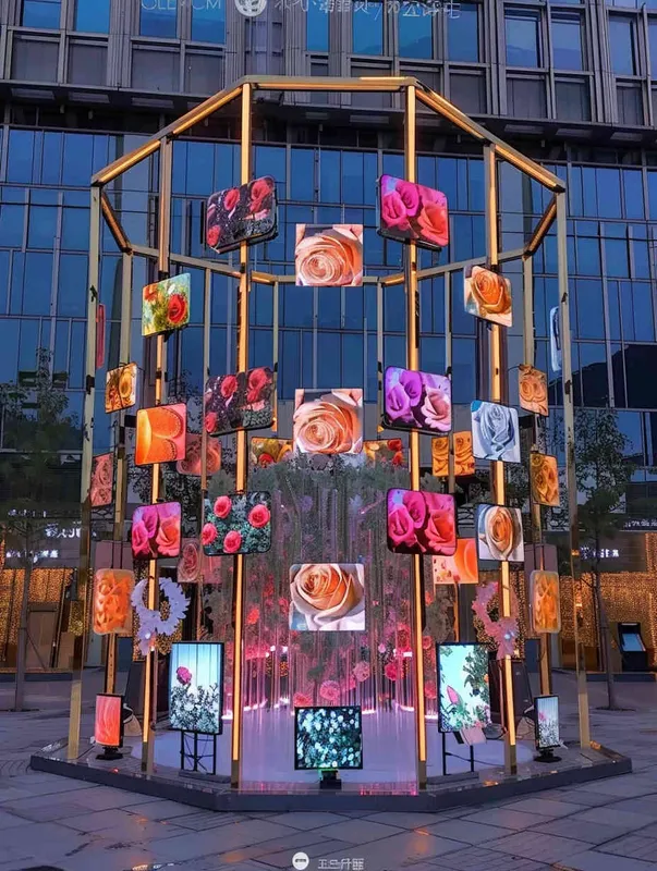 An outdoor digital media art installation, constructed from a golden truss structure, with 30 equally sized LED screens hanging on top, displaying different roses. Front camera, solid color background, lighting effect when the sun is about to set, master photography work, 8k ultra high definition. - style3部分