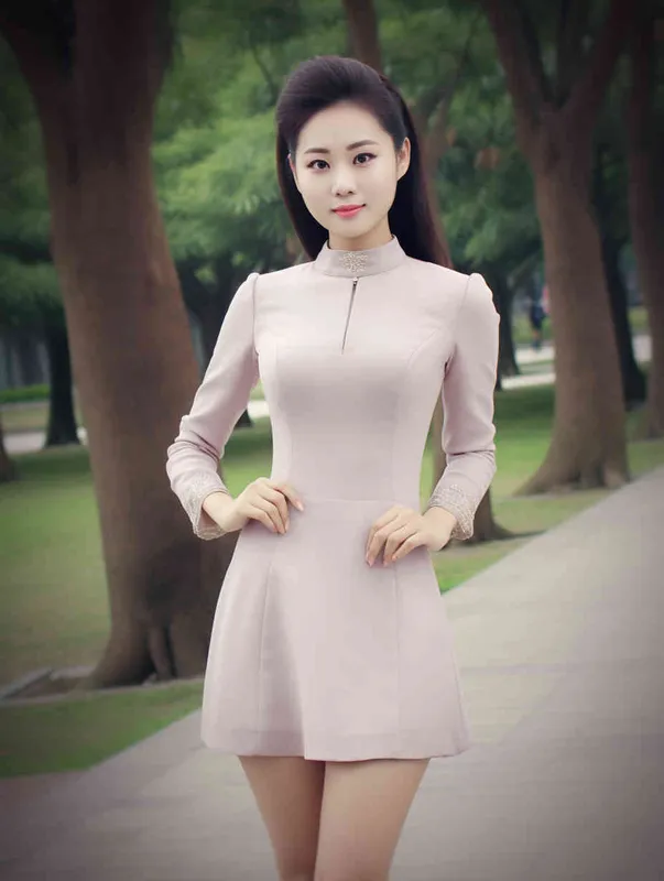 A professional headshot of a Chinese woman in a business suit. She has a confident and approachable expression. The suit is a dark color, perhaps navy or black, and she is wearing a crisp white shirt underneath. Her hair is styled neatly. The background is grey, not distracting from the subject. The lighting is soft and flattering, highlighting her features without creating harsh shadows. The photo is taken with a high-resolution camera, ensuring every detail is captured clearly. The composition is centered, with the woman's face in the middle of the frame. The photo should be hyper-realistic, highly detailed, and high-resolution 16k. --ar 3:4 --v 5.2 --style raw --q 2 --s 250  - style4部分